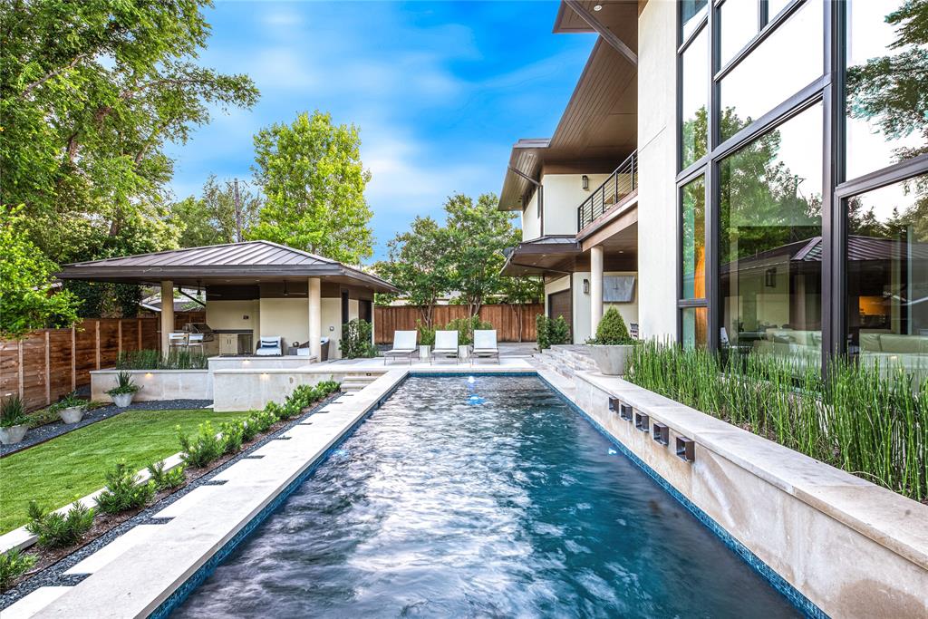 11460 Strait Lane Dallas, TX 75229 - Photo 6 of 39 a front view of house with a garden and patio