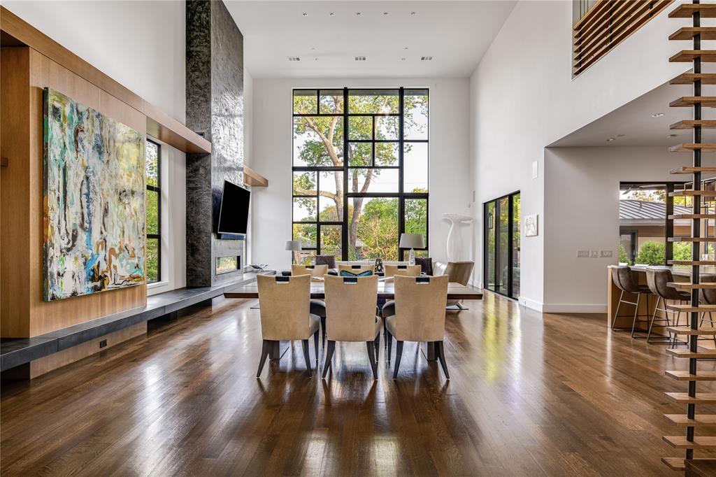 11460 Strait Lane Dallas, TX 75229 - Photo 7 of 39 a view of a dining room with furniture window and wooden floor