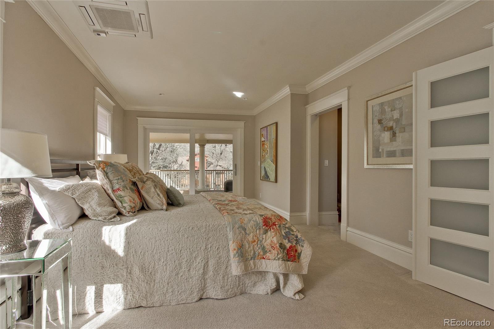 935 10th Street Boulder, CO 80302 - Photo 16 of 40 a bed room with two beds and a window