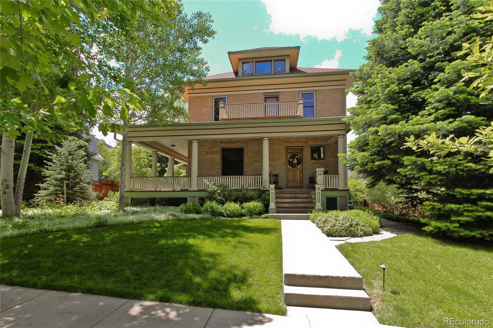 935 10th Street Boulder, CO 80302 - Photo 2 of 40 front view of house with a yard