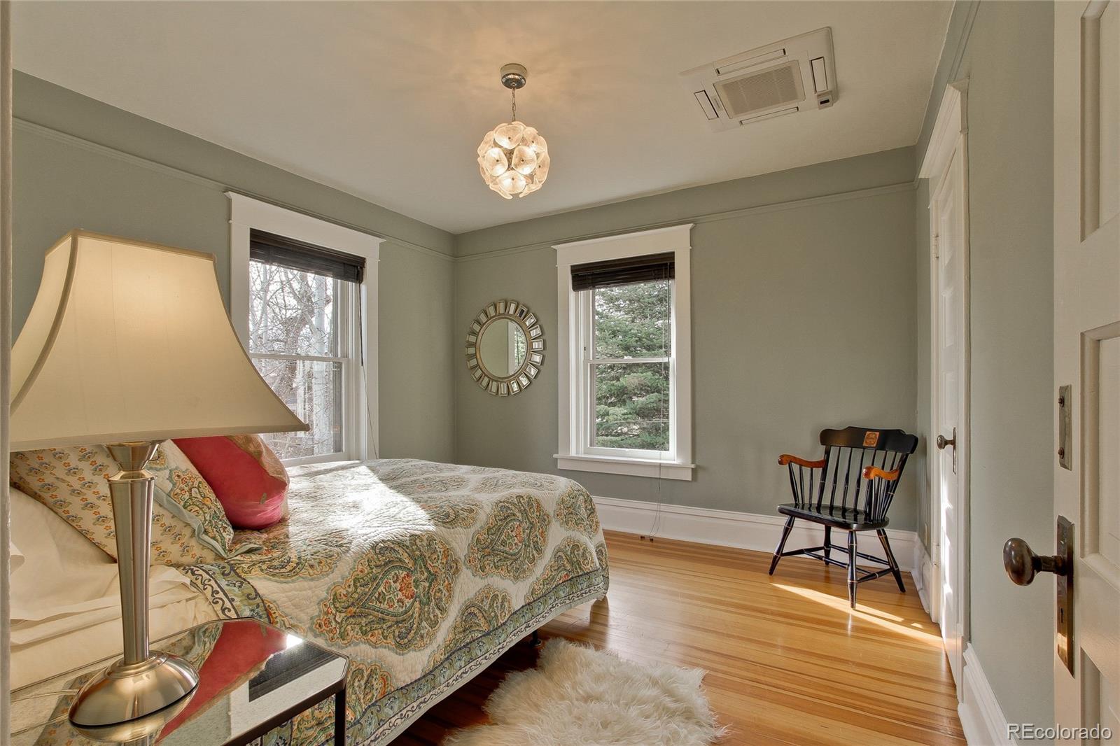 935 10th Street Boulder, CO 80302 - Photo 25 of 40 a bedroom with a bed and a window
