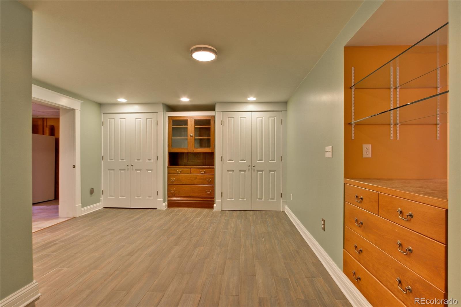 935 10th Street Boulder, CO 80302 - Photo 29 of 40 a view of empty room with wooden floor