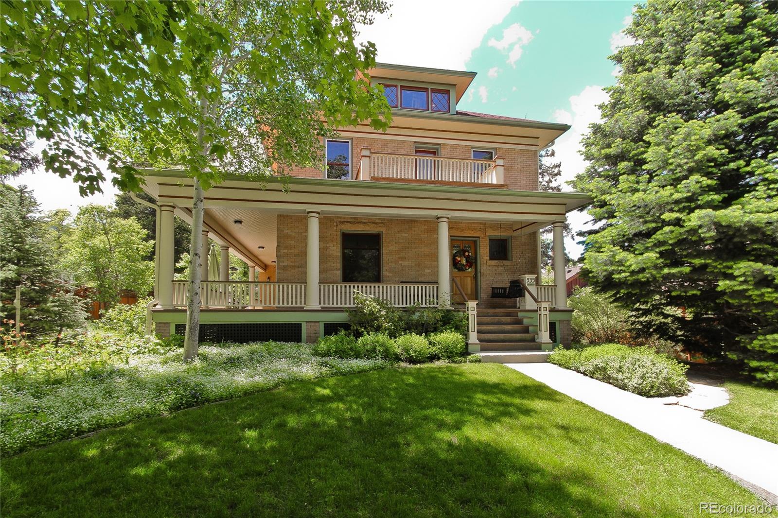 935 10th Street Boulder, CO 80302 - Photo 3 of 40 front view of a house with a yard
