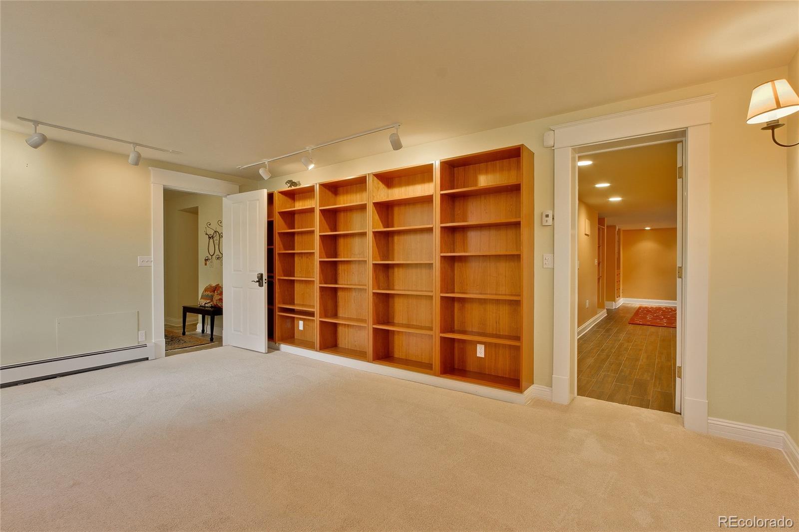 935 10th Street Boulder, CO 80302 - Photo 33 of 40 a view of an empty room with a cabinet and mirrors
