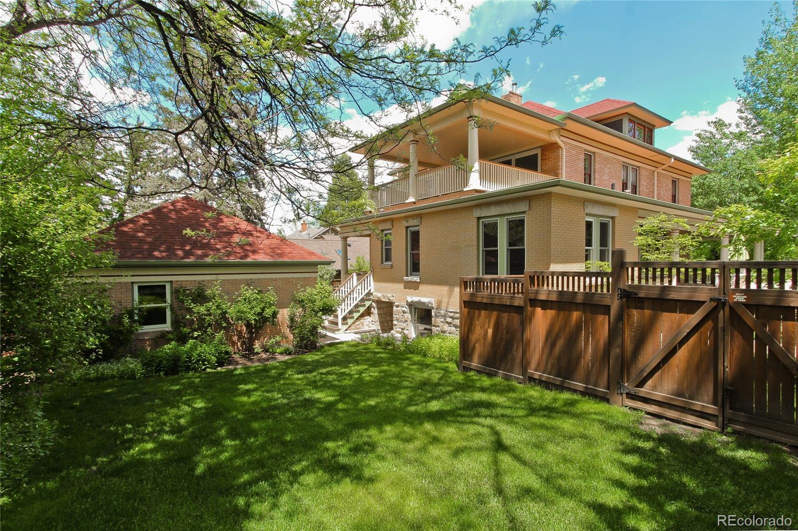 935 10th Street Boulder, CO 80302 - Photo 37 of 40 a front view of a house with garden