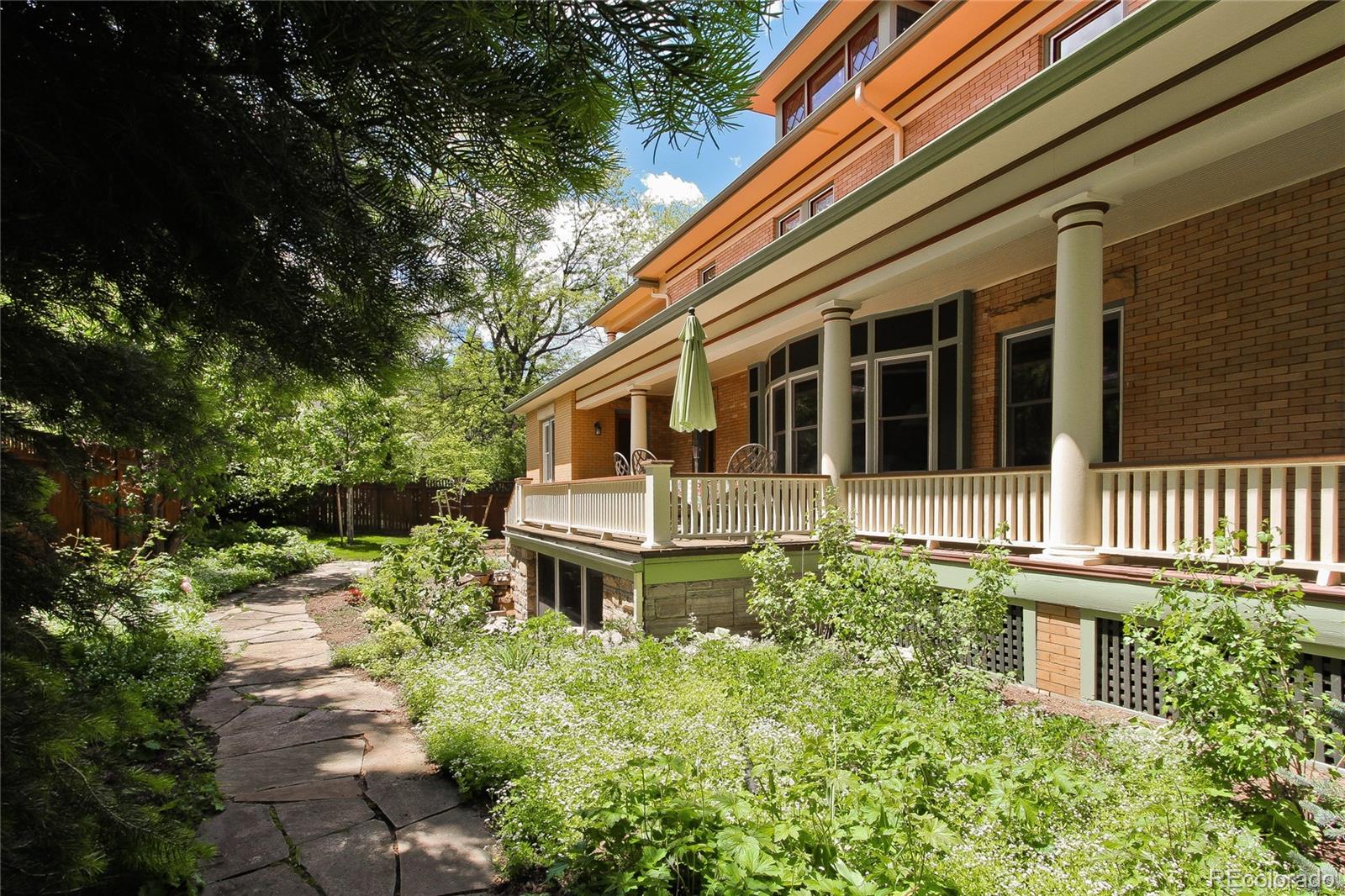935 10th Street Boulder, CO 80302 - Photo 39 of 40 front view of a house with a yard