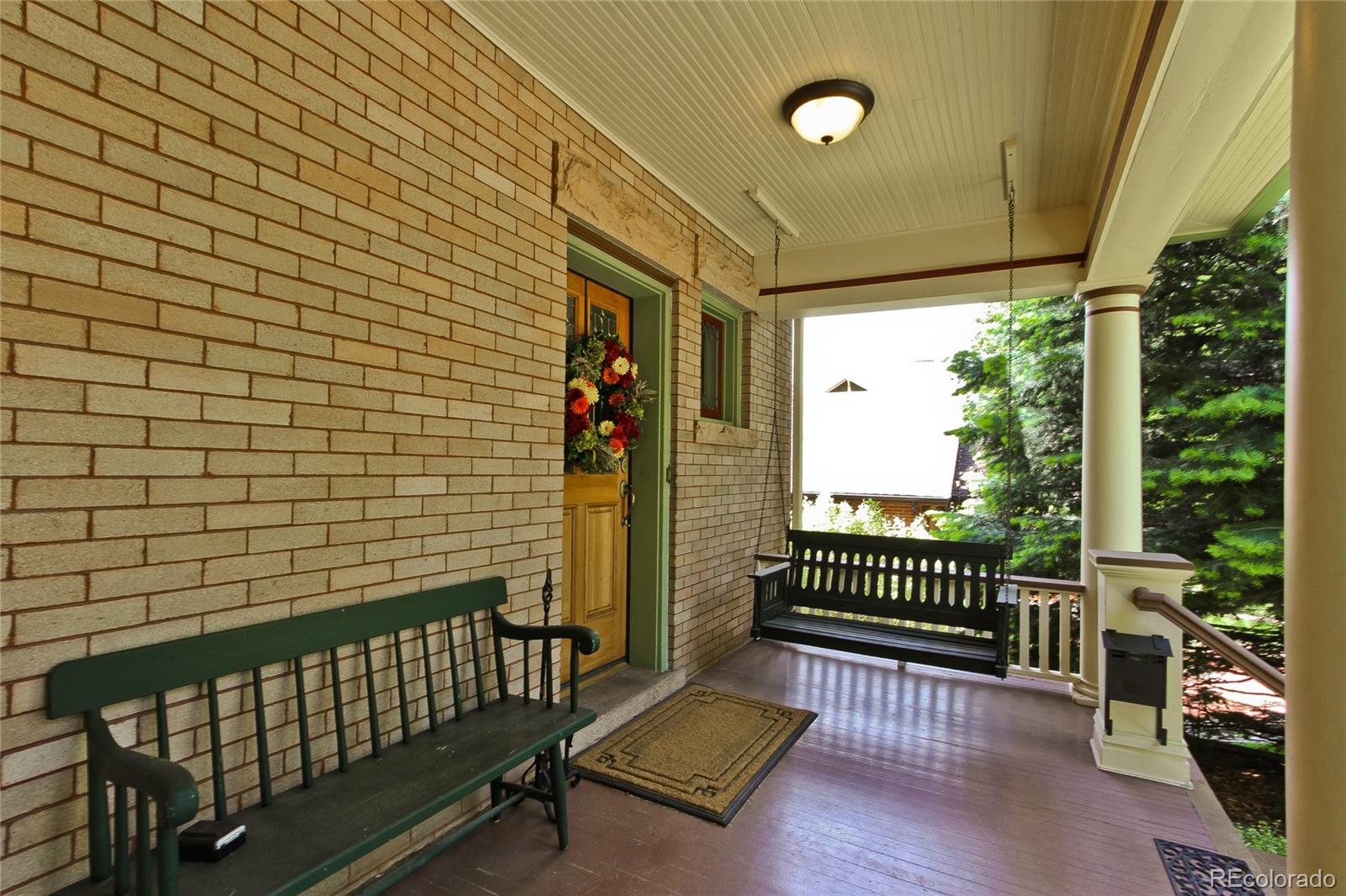 935 10th Street Boulder, CO 80302 - Photo 5 of 40 a view of a porch with furniture