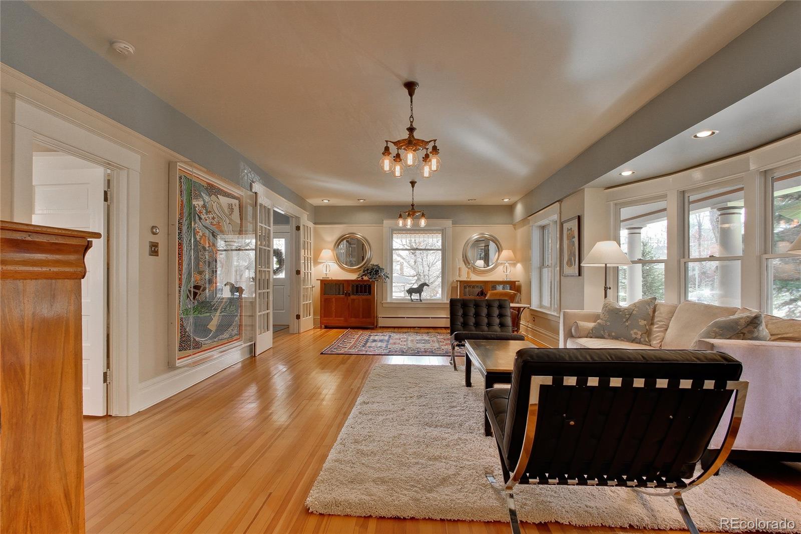 935 10th Street Boulder, CO 80302 - Photo 8 of 40 a living room with furniture and a wooden floor