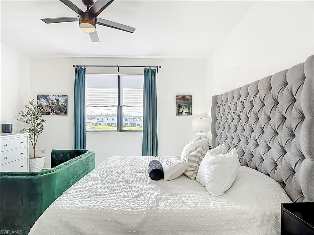 5502 Cassidy Lane Immokalee, FL 34142 - Photo 16 of 20 a bedroom with a large bed and a window