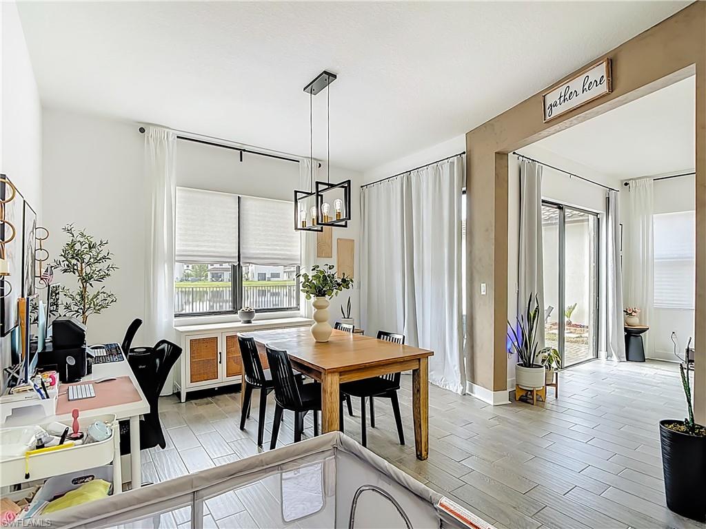 5502 Cassidy Lane Immokalee, FL 34142 - Photo 7 of 20 a view of a dining room with furniture window and outside view