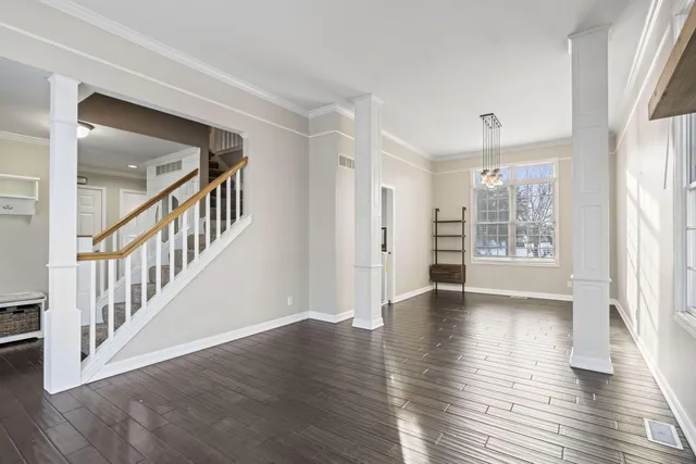 a view of a kitchen with refrigerator stove and a sink