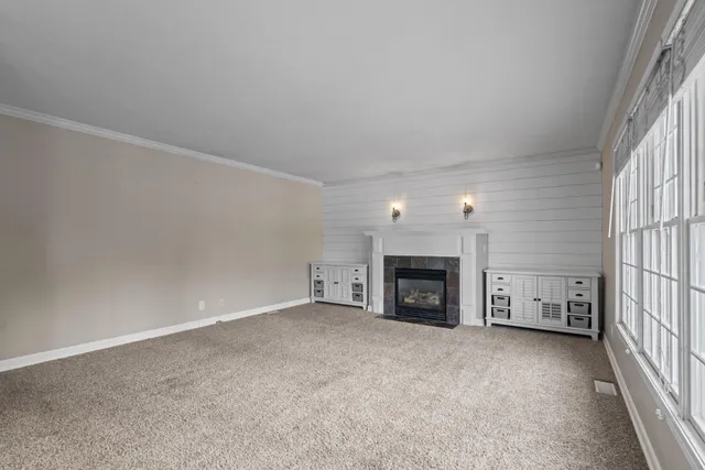 a view of an empty room with a projector