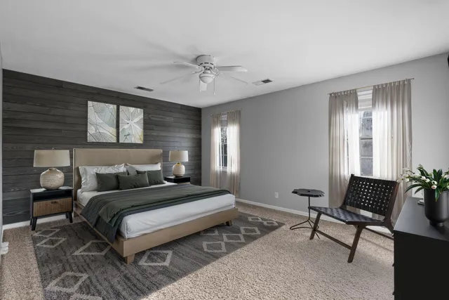 a view of road with a car parked on the road