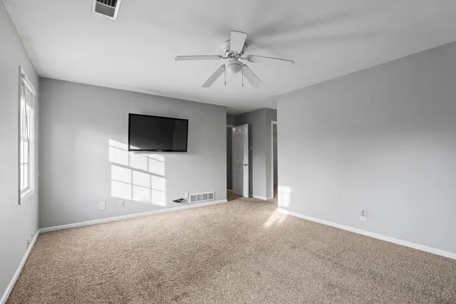 an aerial view of a houses with outdoor space