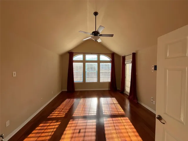 a view of a room with windows