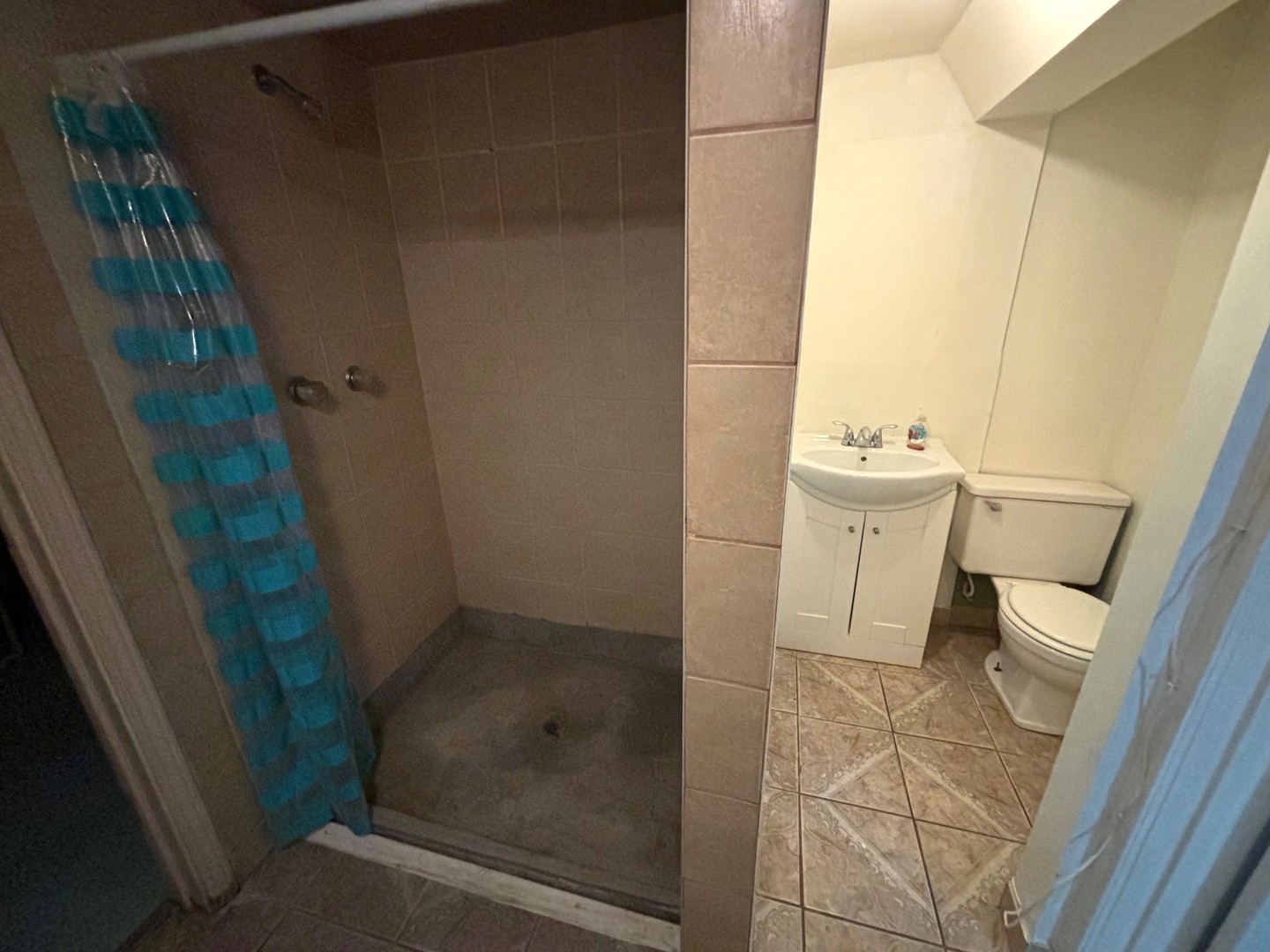 66 East Blecke Avenue, Unit 66 Addison, IL 60101 - Photo 13 of 14 a bathroom with a sink and a toilet