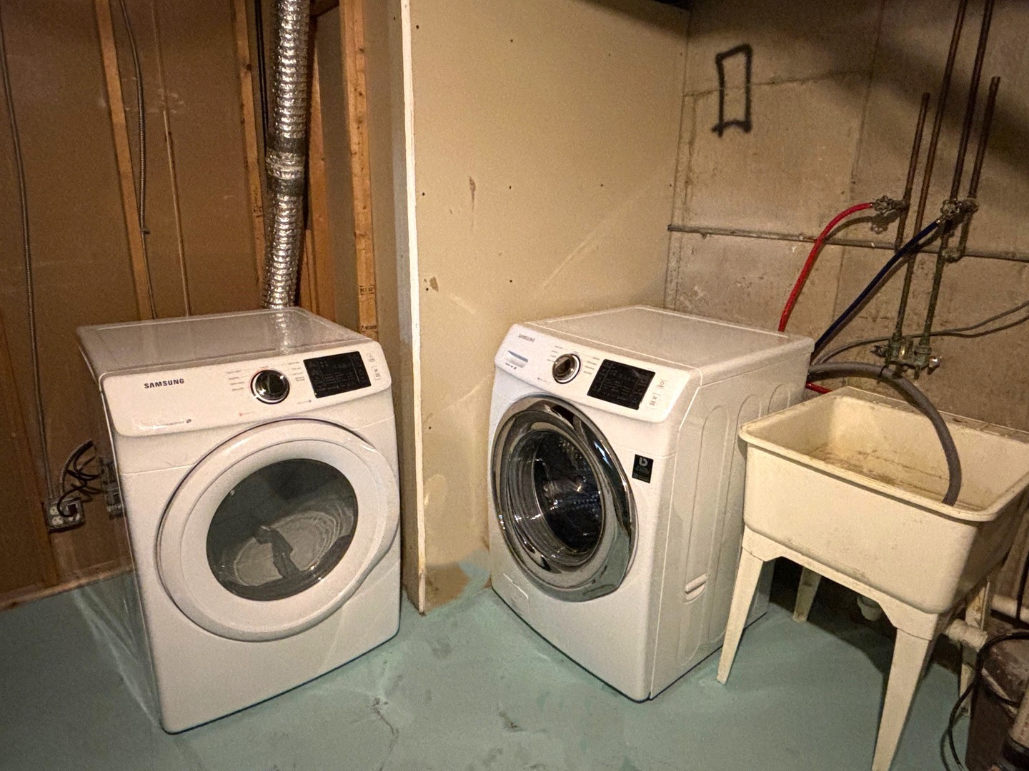 66 East Blecke Avenue, Unit 66 Addison, IL 60101 - Photo 14 of 14 a utility room with dryer and washer