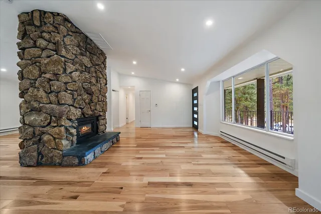 a view of an empty room and window