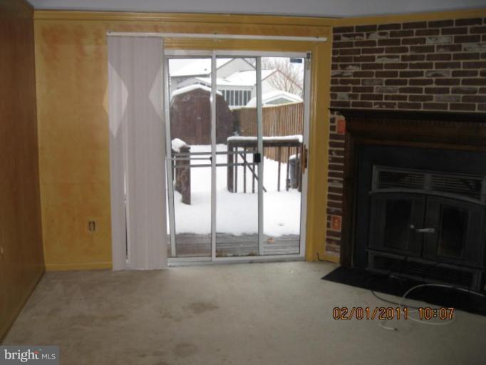 1327 Apple Ridge Court Edgewood, MD 21040 - Photo 1 of 19 a view of empty room with floor to ceiling window