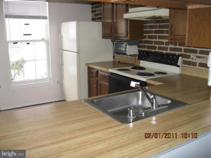 1327 Apple Ridge Court Edgewood, MD 21040 - Photo 13 of 19 a kitchen with kitchen island a counter top space and cabinets