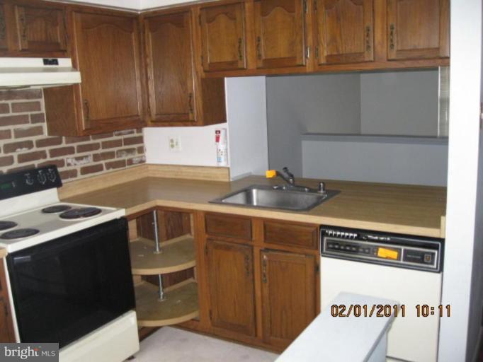 1327 Apple Ridge Court Edgewood, MD 21040 - Photo 14 of 19 a kitchen with a stove and a sink