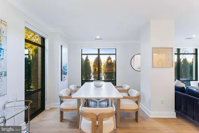 a bathroom with double sink and a mirror