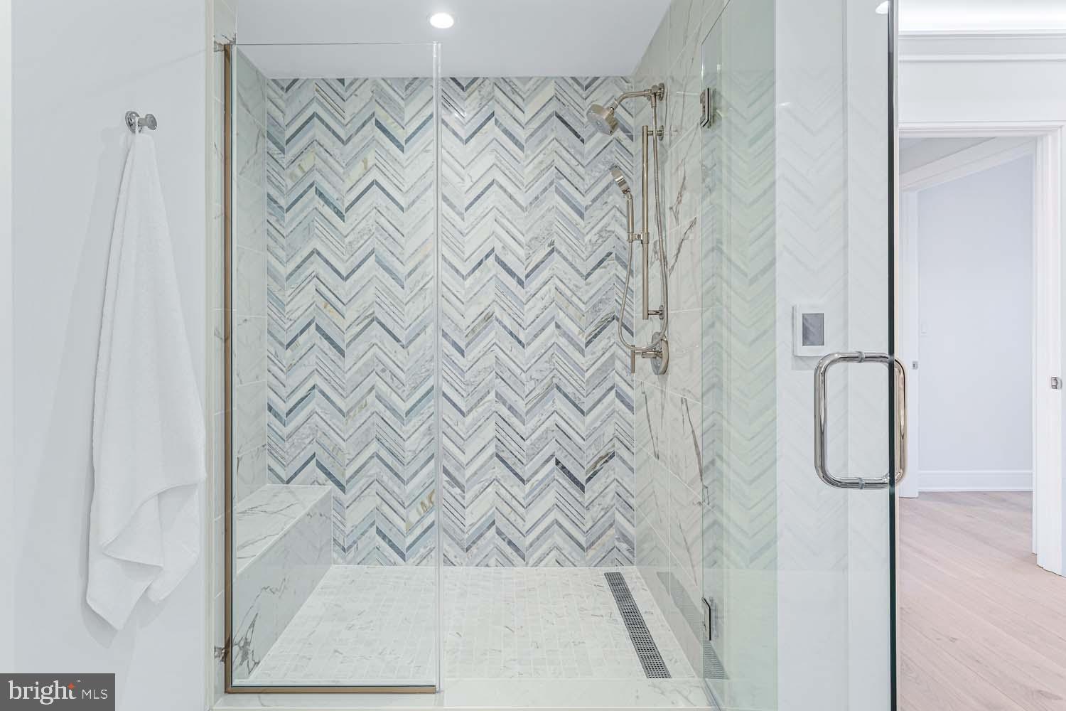 6718 Lowell Avenue, Unit 406 McLean, VA 22101 - Photo 26 of 86 a bathroom with a shower
