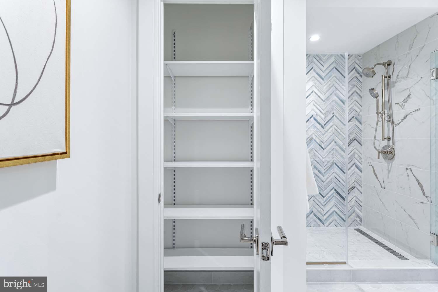 6718 Lowell Avenue, Unit 406 McLean, VA 22101 - Photo 28 of 86 a bathroom with a bathtub