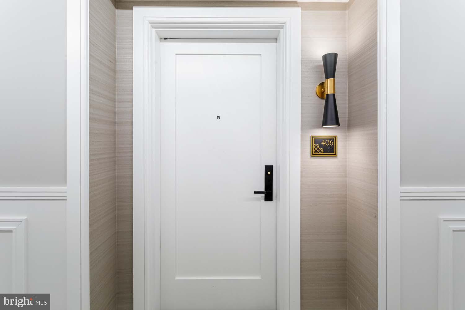 6718 Lowell Avenue, Unit 406 McLean, VA 22101 - Photo 2 of 86 a bathroom with a shower and a door