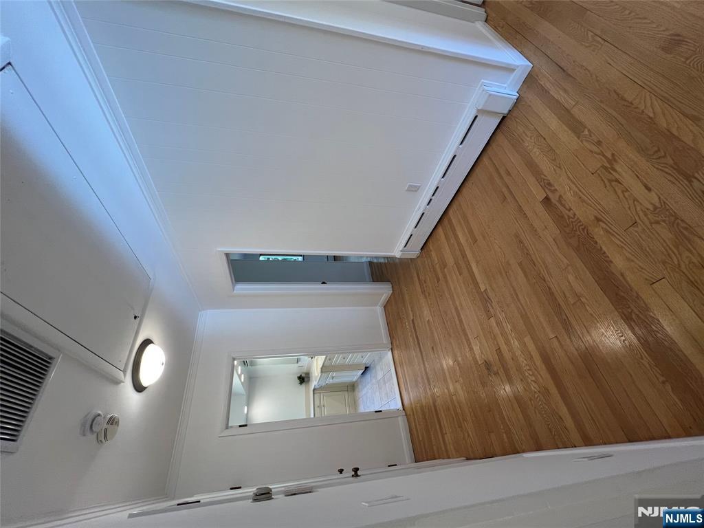 391 Forest Road Mahwah, NJ 07430 - Photo 13 of 32 wooden floor in an empty room