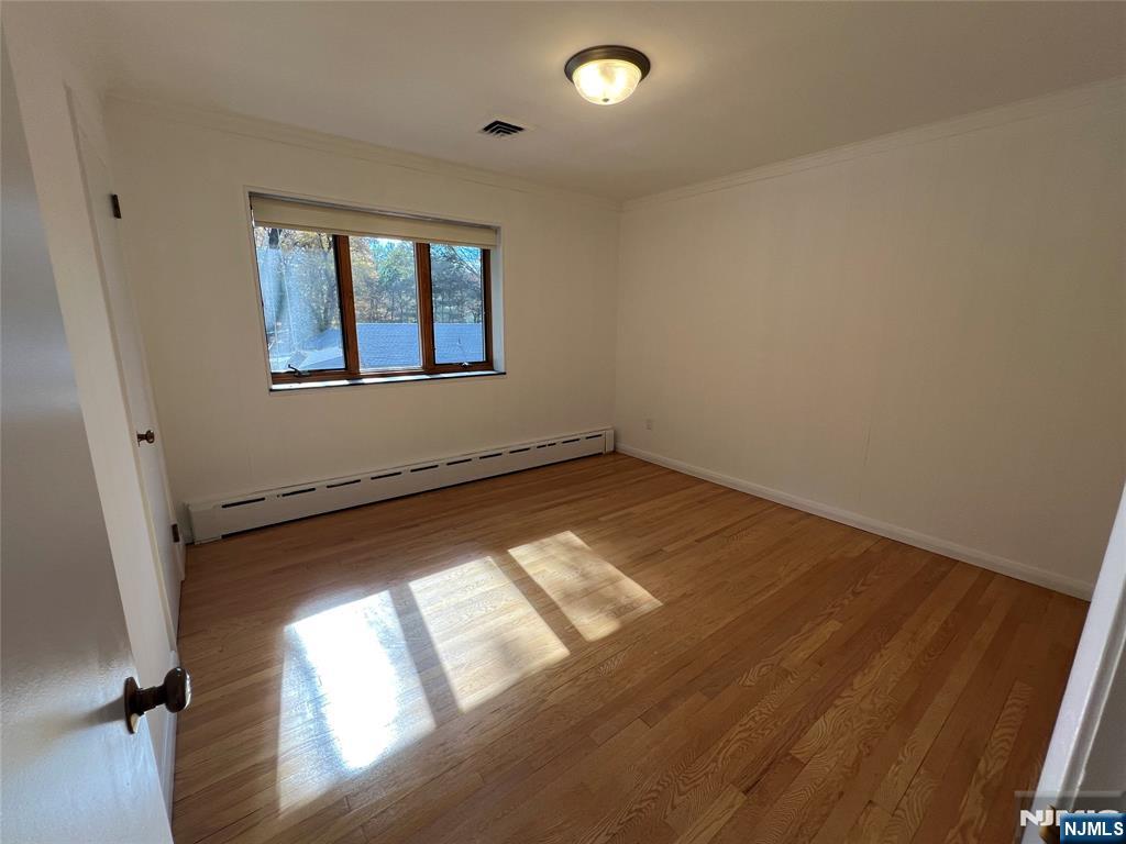 391 Forest Road Mahwah, NJ 07430 - Photo 16 of 32 an empty room with windows