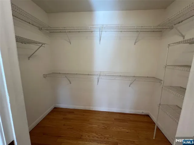 a view of a room with racks on the wall