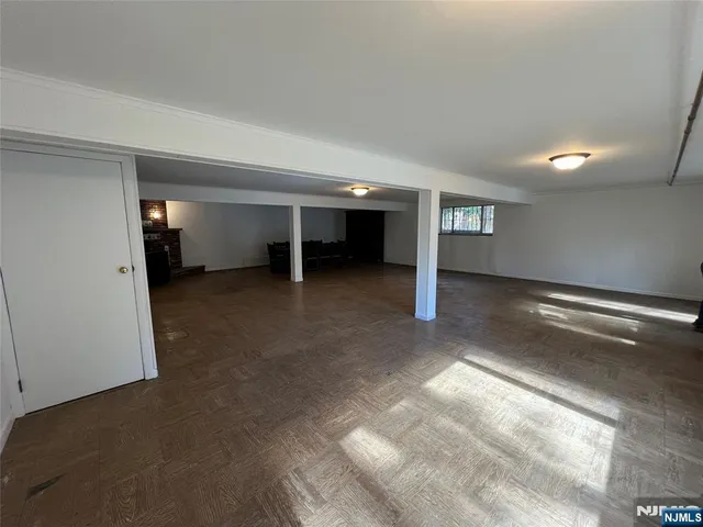 a view of a livingroom with a staircase
