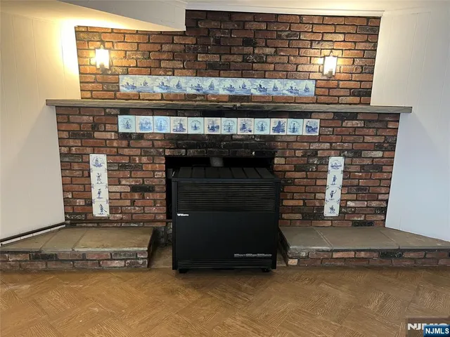 a living room with fireplace