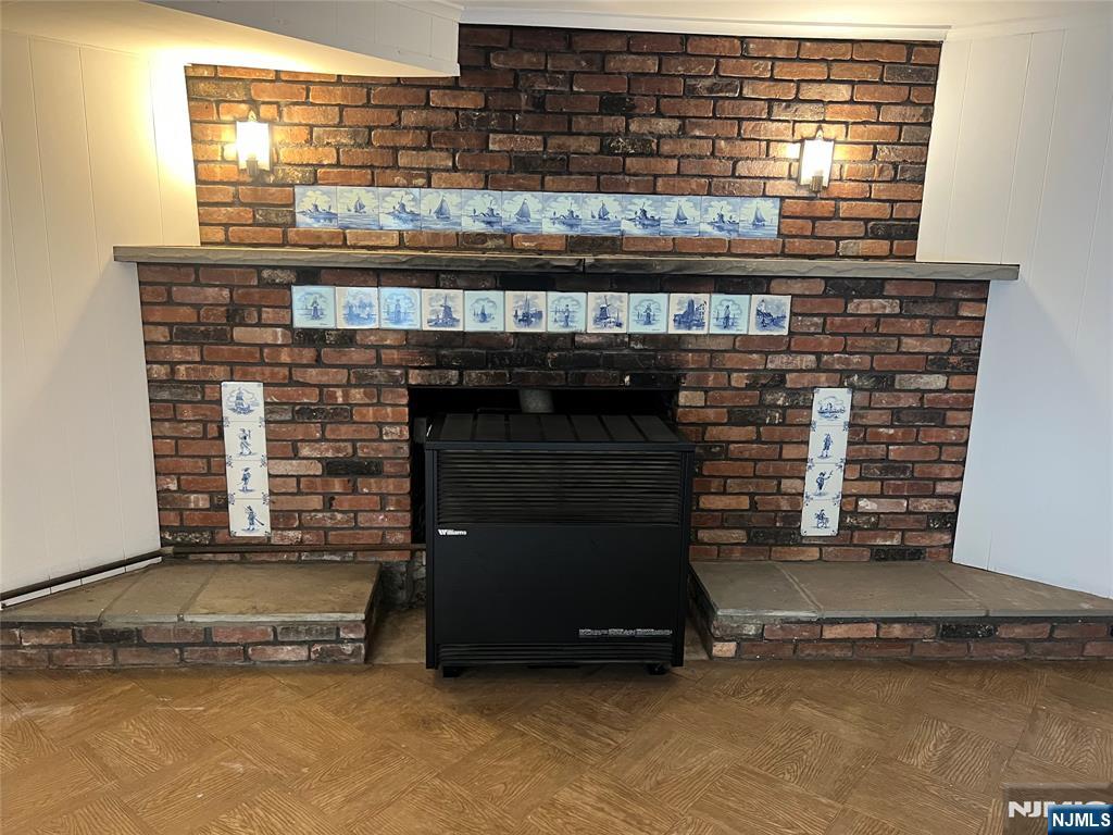 391 Forest Road Mahwah, NJ 07430 - Photo 26 of 32 a living room with fireplace