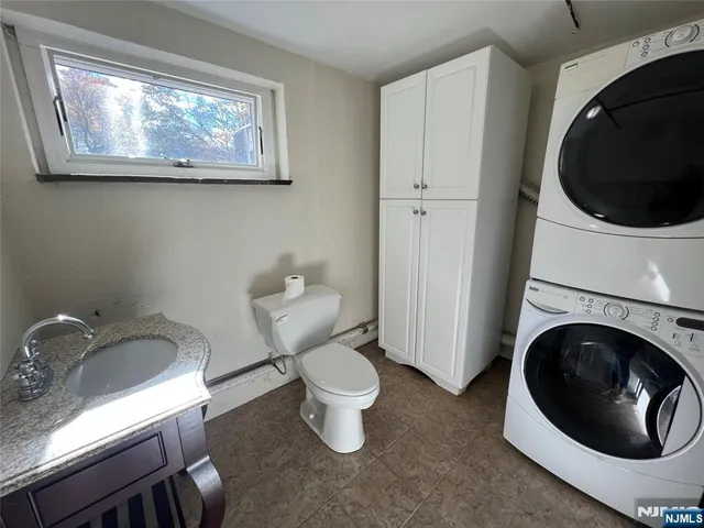 a bathroom with a toilet and a sink