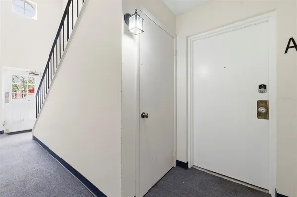 a view of hallway with stairs