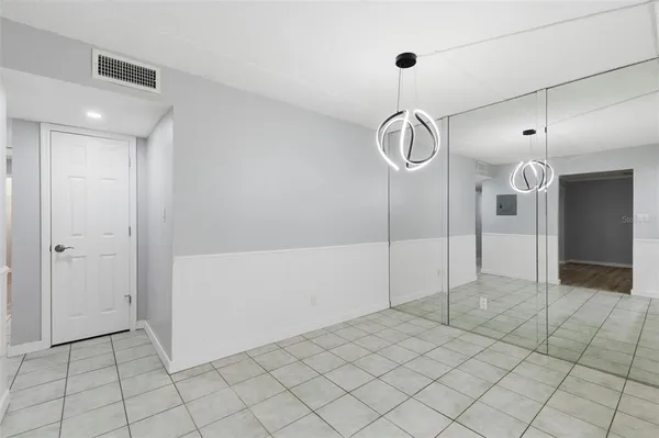 a kitchen with a refrigerator sink and stove top oven