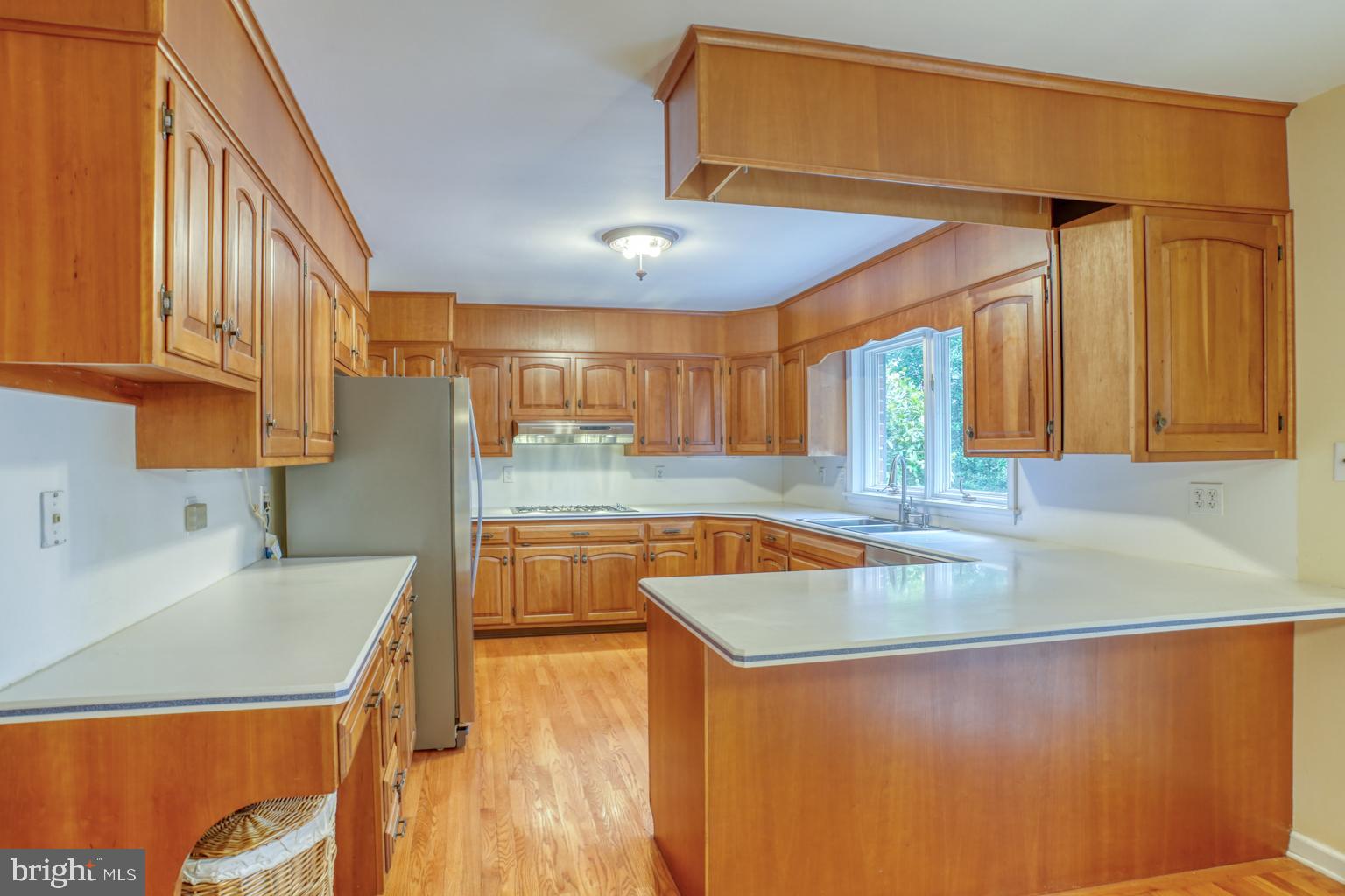 5 Stuart Drive Dover, DE 19901 - Photo 24 of 64 a view of a kitchen with stainless steel appliances granite countertop a sink and a refrigerator