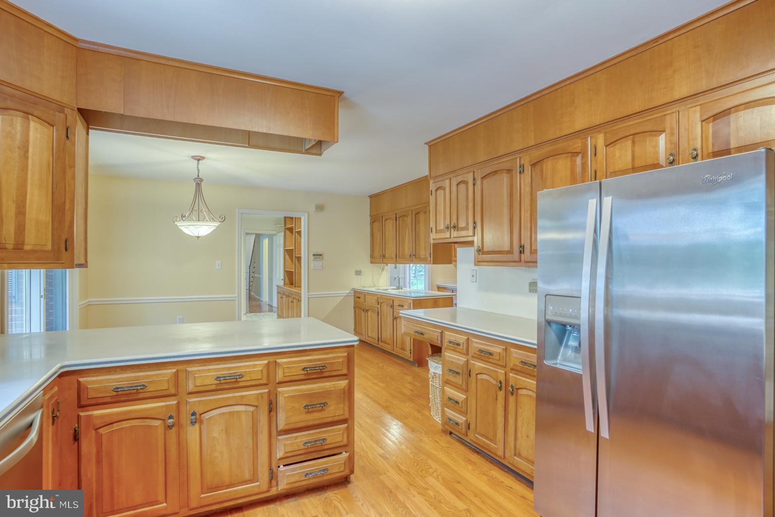 5 Stuart Drive Dover, DE 19901 - Photo 27 of 64 a kitchen with stainless steel appliances granite countertop a refrigerator and a sink