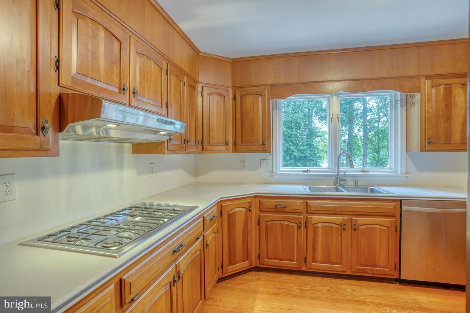 5 Stuart Drive Dover, DE 19901 - Photo 29 of 64 a kitchen with stainless steel appliances granite countertop a sink cabinets and a window