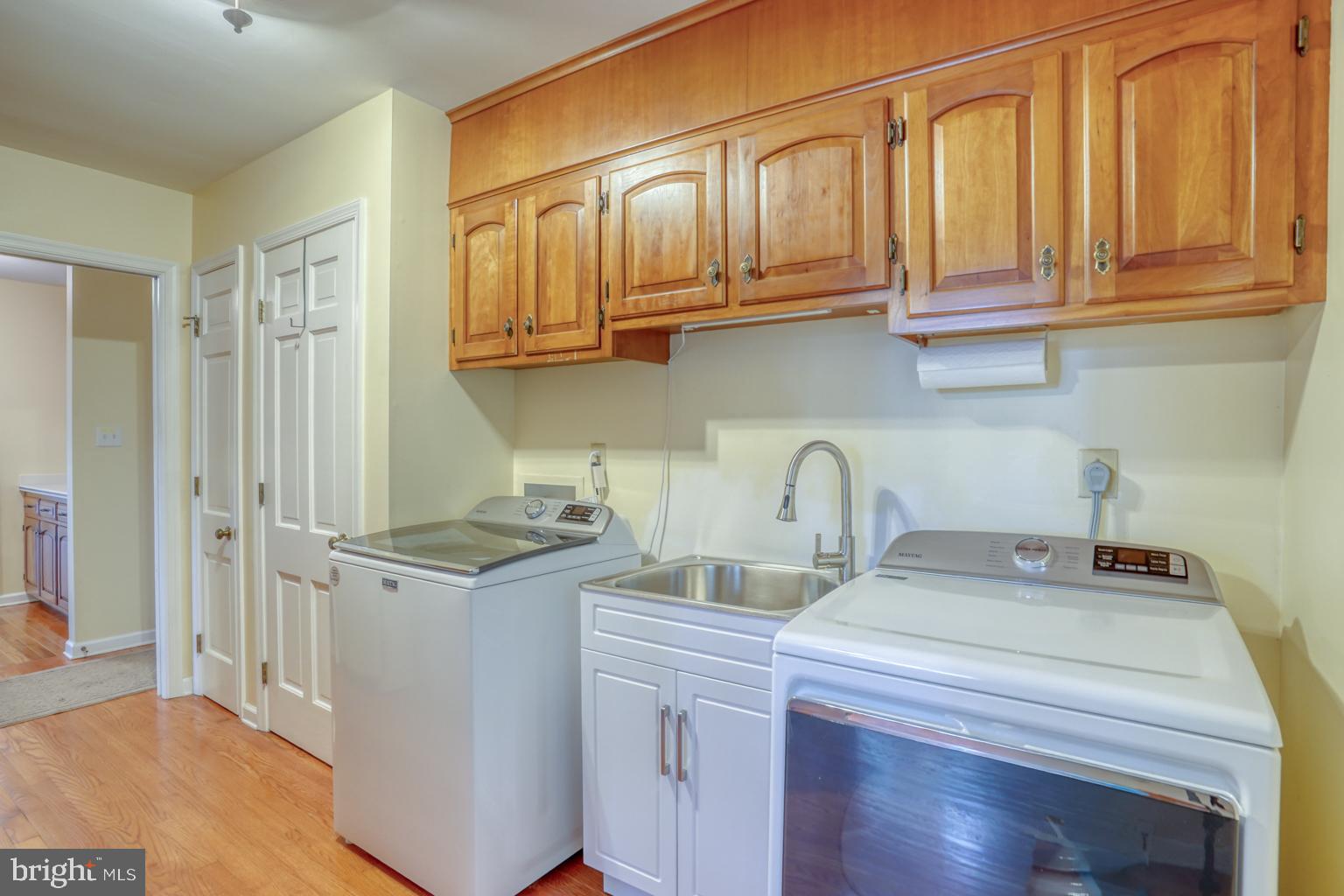 5 Stuart Drive Dover, DE 19901 - Photo 31 of 64 a kitchen with stainless steel appliances granite countertop a sink and cabinets