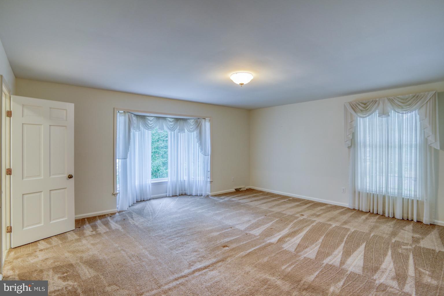 5 Stuart Drive Dover, DE 19901 - Photo 39 of 64 a view of an empty room with a window