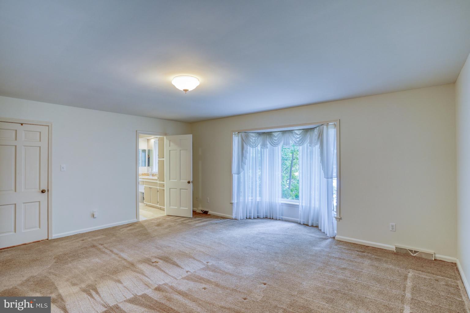 5 Stuart Drive Dover, DE 19901 - Photo 40 of 64 an empty room with windows