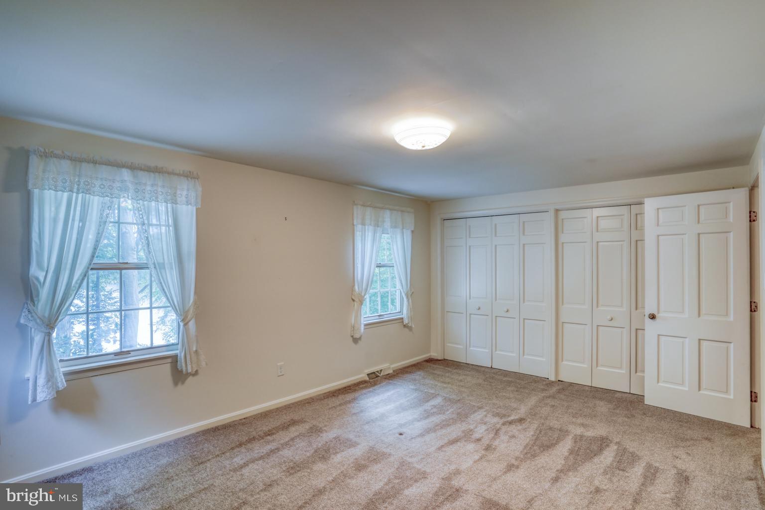 5 Stuart Drive Dover, DE 19901 - Photo 45 of 64 a view of an empty room with a window