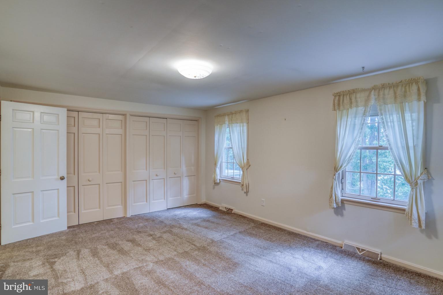 5 Stuart Drive Dover, DE 19901 - Photo 47 of 64 an empty room with windows
