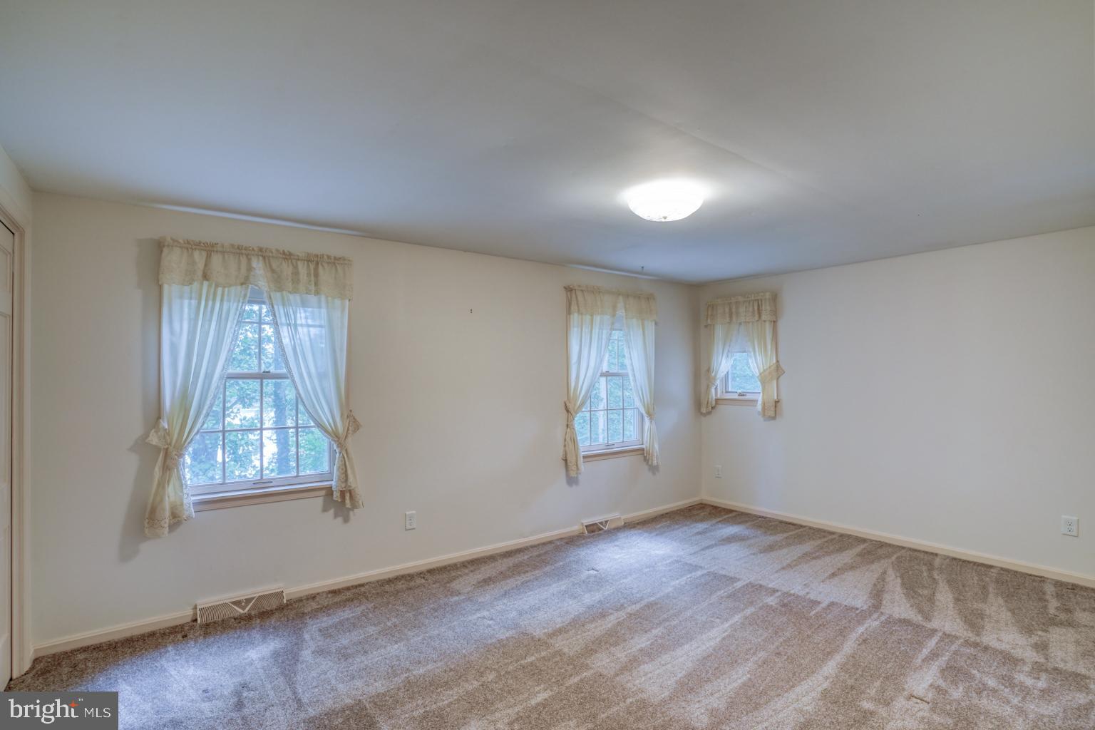 5 Stuart Drive Dover, DE 19901 - Photo 48 of 64 an empty room with windows