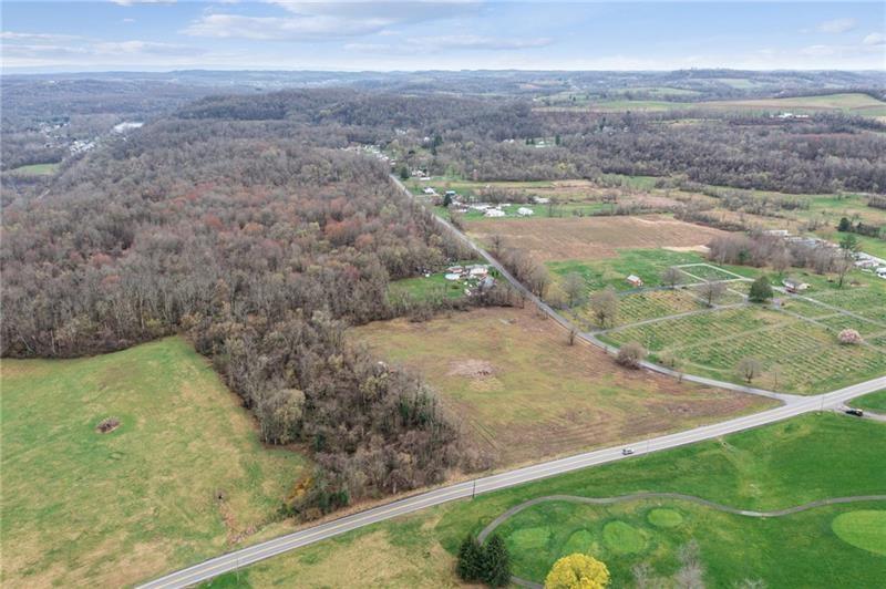 111 Van Meter Road Belle Vernon, PA 15012 - Photo 4 of 10 a view of a yard with wooden fence