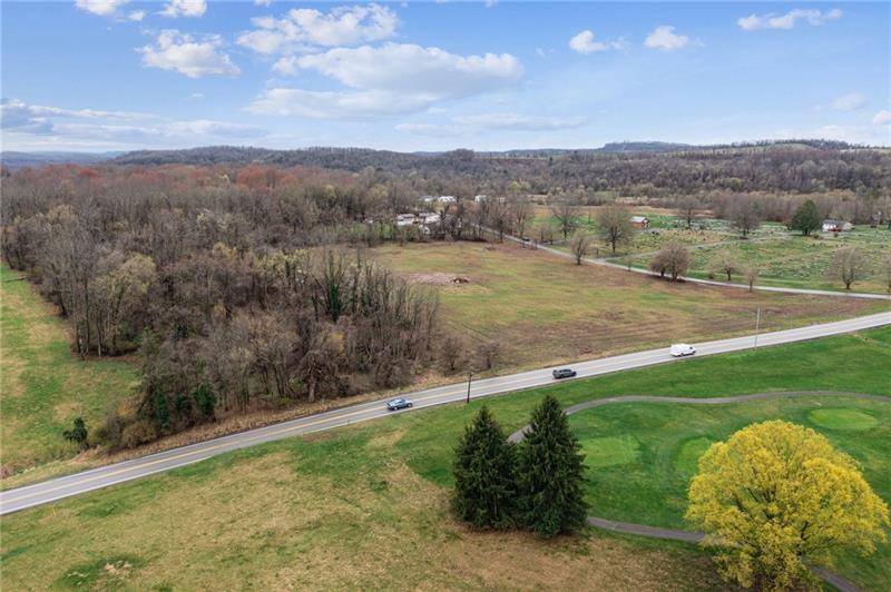 111 Van Meter Road Belle Vernon, PA 15012 - Photo 6 of 10 a view of a lake from a yard