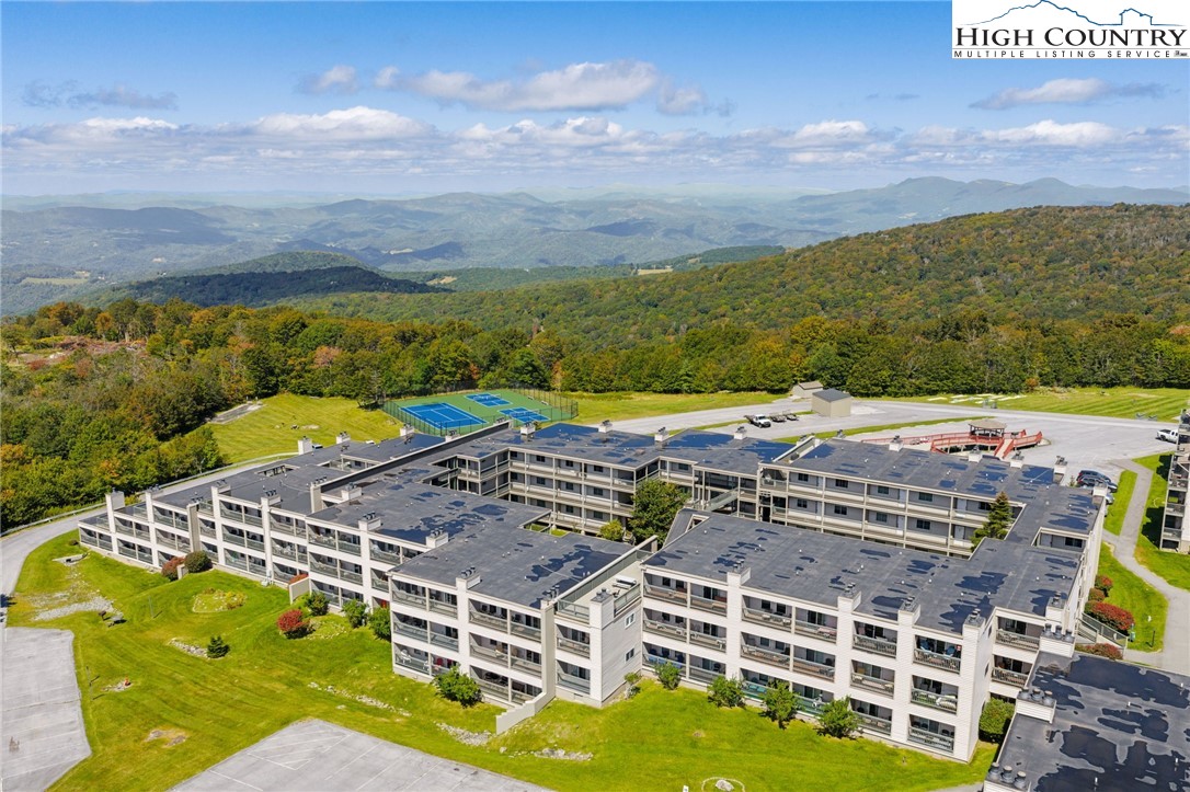 301 Pinnacle Inn Road, Unit 3219 Beech Mountain, NC 28604 - Photo 2 of 30 a view of a city that has tall buildings